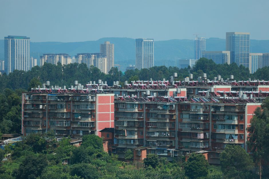 成都青羊区老房装暖气片还是地暖？层高和预算决定方案